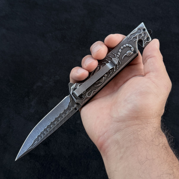 Полуавтоматичен сгъваем нож SCORPIO Black,черно гравирано острие, палец за отваряне с една ръка